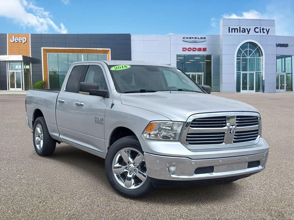 2018 RAM 1500 Big Horn Quad Cab 4x4 6'4' Box in Bright Silver Metallic Clearcoat — front three-quarter view