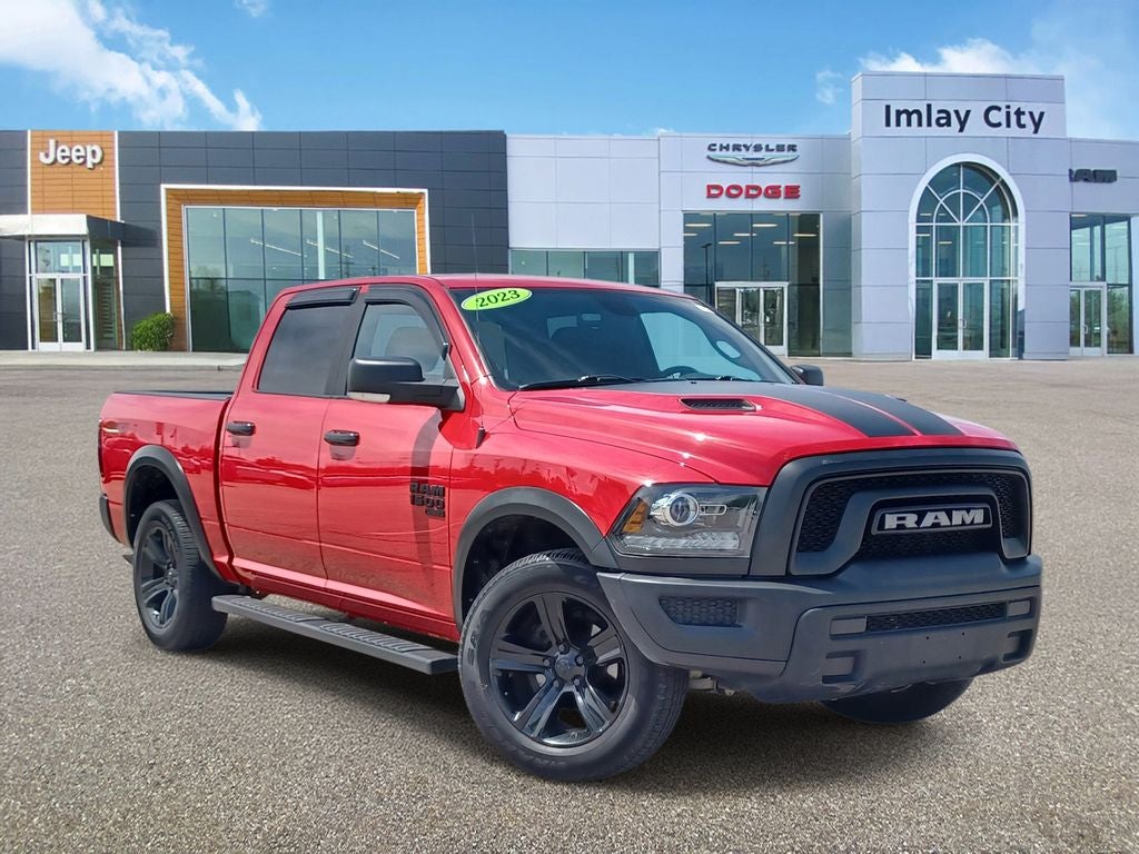 2023 RAM 1500 Classic SLT in Flame Red Clearcoat — front three-quarter view