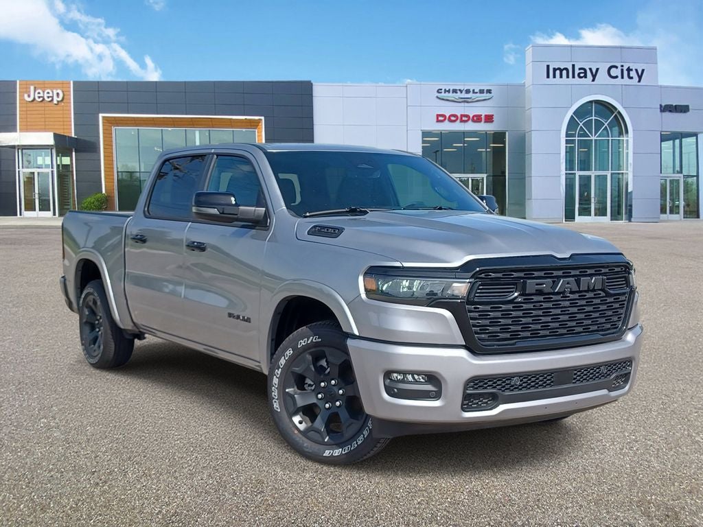 2026 RAM Ram 1500 RAM 1500 BIG HORN CREW CAB 4X4 5'7' BOX in Billet Silver Metallic Clear-Coat Exterior Paint — front three-quarter view
