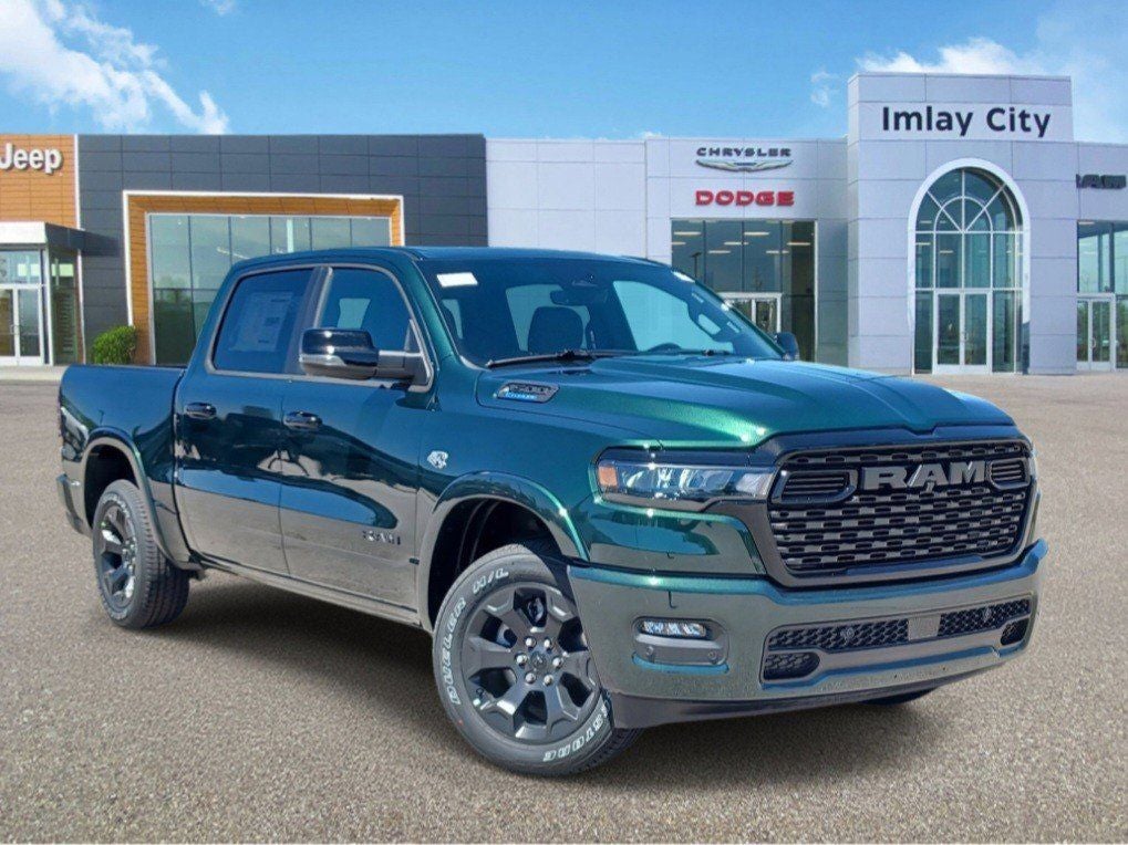 2026 RAM Ram 1500 RAM 1500 BIG HORN CREW CAB 4X4 5'7' BOX in Serrano-Green Metallic Exterior Paint — front three-quarter view