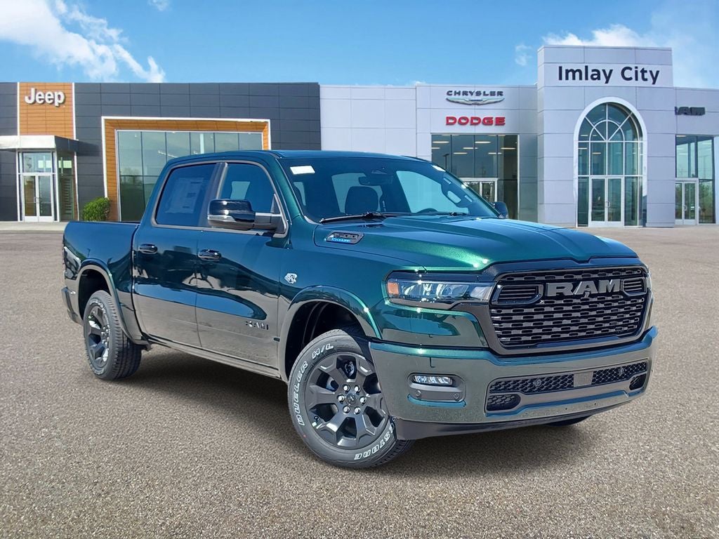 2026 RAM Ram 1500 RAM 1500 BIG HORN CREW CAB 4X4 5'7' BOX in Serrano-Green Metallic Exterior Paint — front three-quarter view