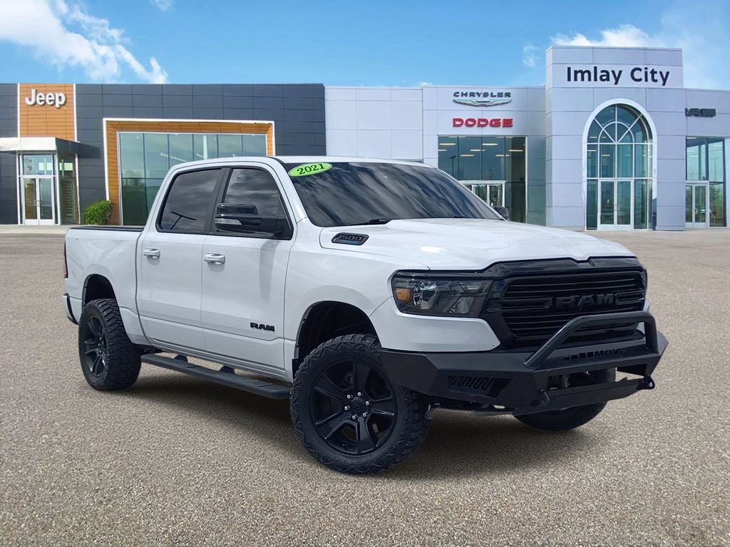 2021 RAM 1500 Big Horn Crew Cab 4x4 5'7' Box in Bright White Clearcoat — front three-quarter view