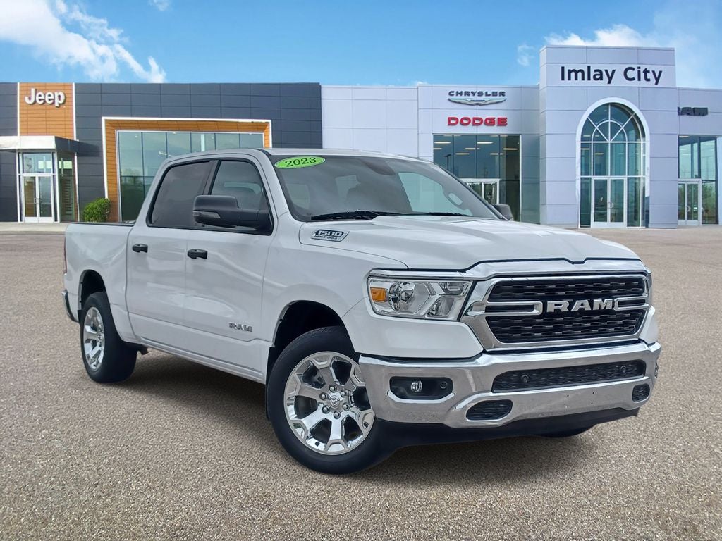 2023 RAM 1500 Big Horn Crew Cab 4x4 5'7' Box in Bright White Clearcoat — front three-quarter view