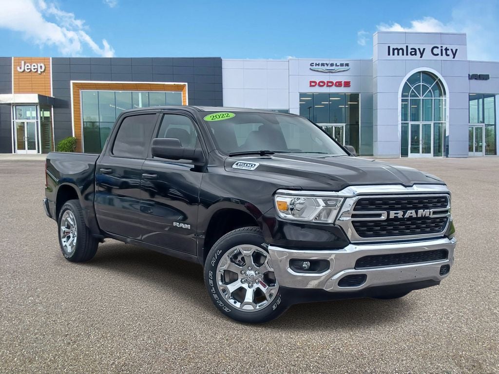 2022 RAM 1500 Big Horn Crew Cab 4x4 5'7' Box in Diamond Black Crystal Pearlcoat — front three-quarter view