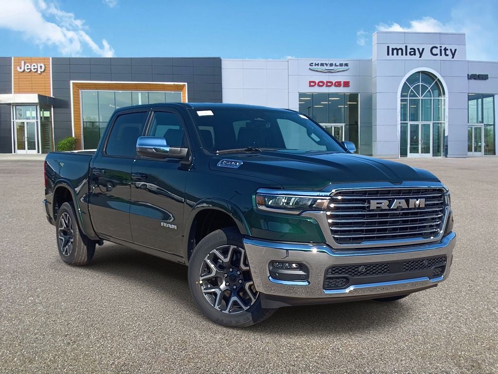 2026 RAM Ram 1500 RAM 1500 LARAMIE CREW CAB 4X4 5'7' BOX in Serrano-Green Metallic Exterior Paint — front three-quarter view