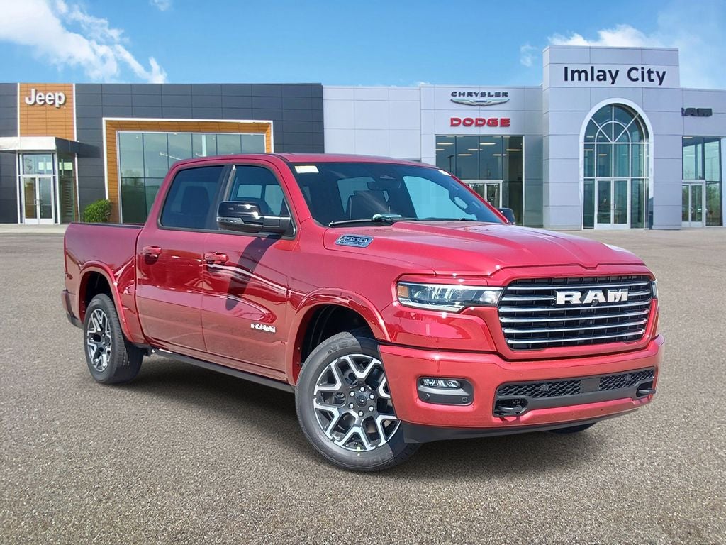 2026 RAM Ram 1500 RAM 1500 LARAMIE CREW CAB 4X4 5'7' BOX in Molten Red Pearl-Coat Exterior Paint — front three-quarter view