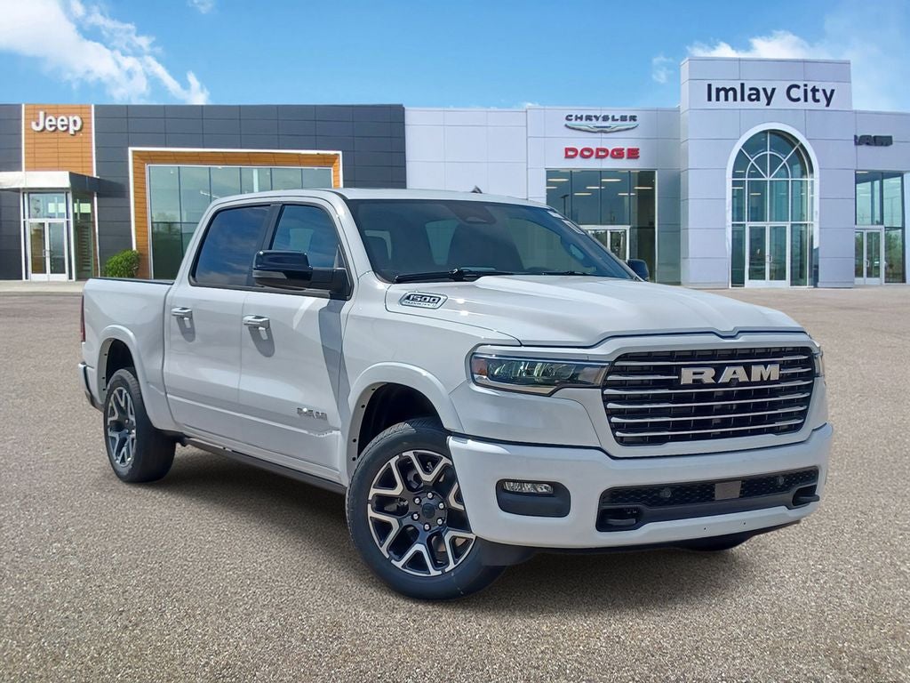 2026 RAM Ram 1500 RAM 1500 LARAMIE CREW CAB 4X4 5'7' BOX in Bright White Clear-Coat Exterior Paint — front three-quarter view