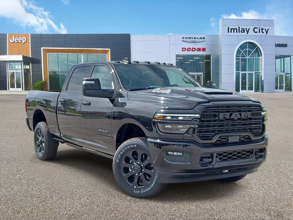 2026 RAM Ram 2500 RAM 2500 LARAMIE CREW CAB 4X4 6'4' BOX in Diamond Black Crystal Pearl-Coat Exterior Paint — front three-quarter view
