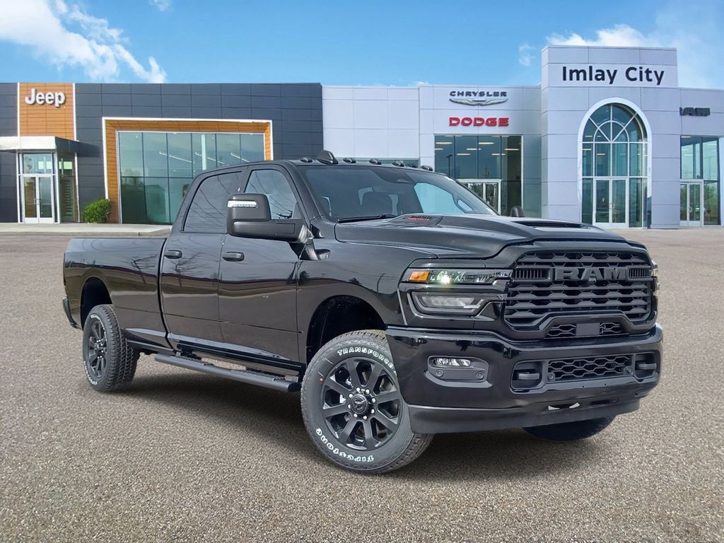 2026 RAM Ram 2500 RAM 2500 BLACK EXPRESS CREW CAB 4X4 8' BOX in Diamond Black Crystal Pearl-Coat Exterior Paint — front three-quarter view