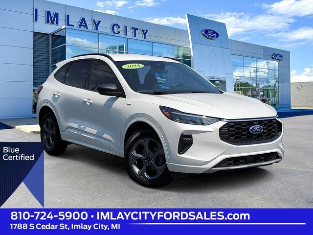 2024 Ford Escape ST-Line in Star White Metallic Tri-Coat — front three-quarter view