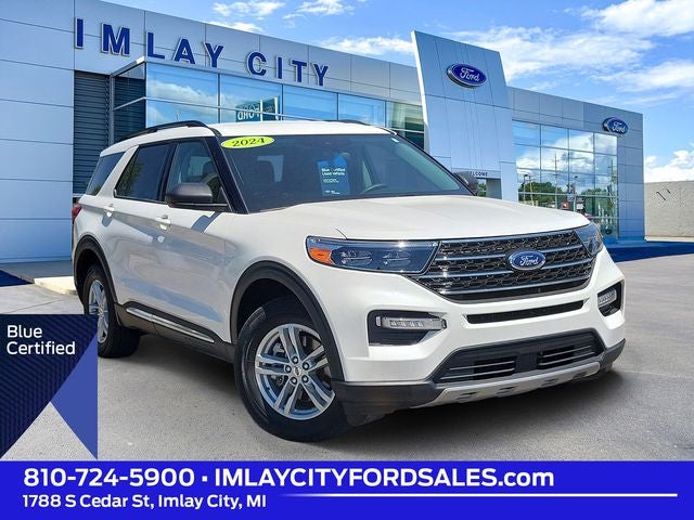 2024 Ford Explorer XLT in Star White Metallic Tri-Coat — front three-quarter view
